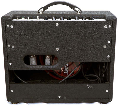 The Carr Rambler Combo Amp, a black guitar amplifier from 2008, equipped with a power supply for optimal performance.