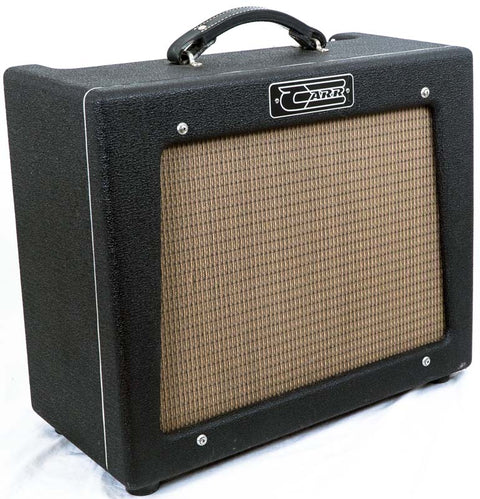 The Carr Rambler Combo Amp, a black guitar amplifier with a stylish brown cover, made in the USA in 2008.