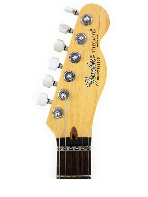 The Fender American Standard Stratocaster, featuring a classic body shape and high-quality craftsmanship, ideal for performances.