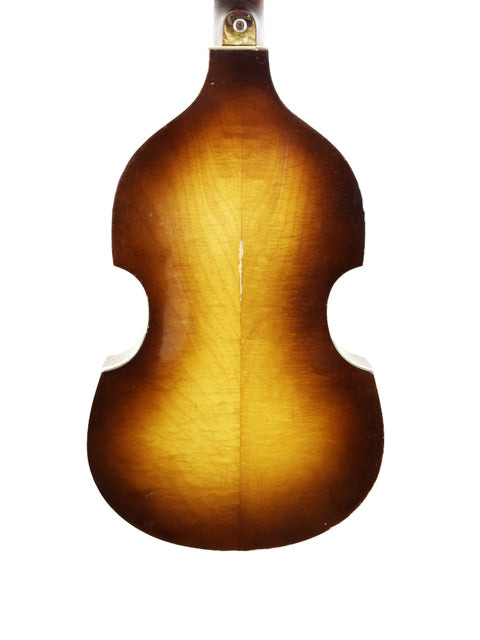 The back of a 1962 Hofner 500/1 'Beatle Bass' guitar, highlighted by a stunning sunburst finish that enhances its classic appeal.
