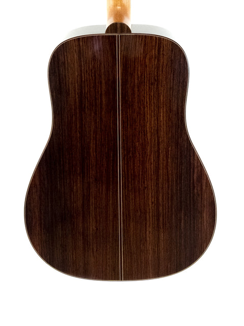 The wooden back of a Lakewood D-32 Dreadnought acoustic guitar, highlighting its craftsmanship from Germany, 2015.
