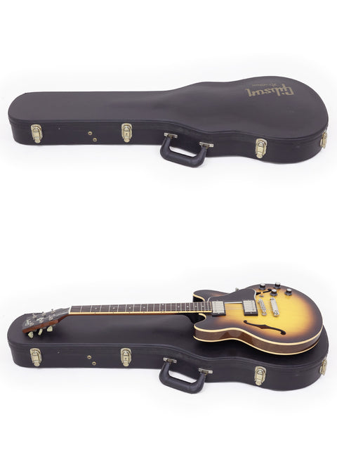 Two guitars in protective cases, featuring a 2009 Gibson Custom Shop ES 339 Memphis, illustrating their beauty and detail.