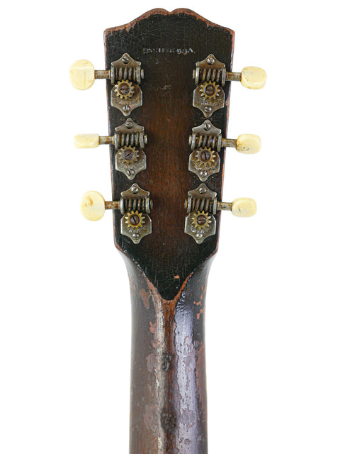 Vintage 1930s Gibson guitar headstock from the L-C ‘Century of Progress’ model, showcasing classic design and craftsmanship.