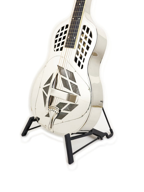 Vintage 1932 National Tricone Style 1.5 Squareneck guitar in white, resting on a black stand.