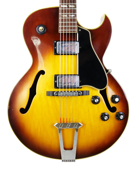 Vintage Gibson ES-175D guitar with a stunning sunburst finish, showcasing its classic 1970s design and craftsmanship.