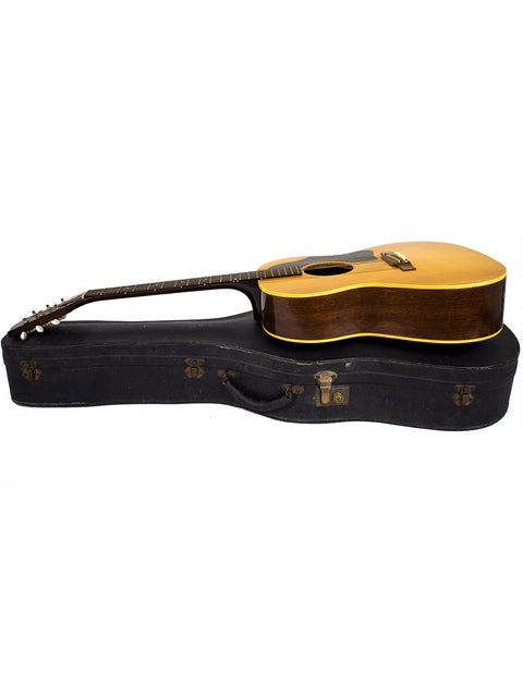 Vintage Gibson LG-3 Acoustic guitar from 1962, nestled in a case on a white backdrop.