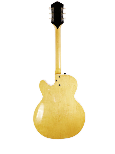 Vintage Harmony H71 Meteor yellow guitar on a clean white background, perfect for collectors and music enthusiasts alike.
