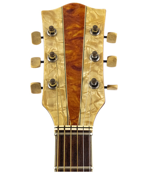 Vintage Hofner 455 Archtop guitar headstock close-up, capturing the unique design elements from the 1950s era.