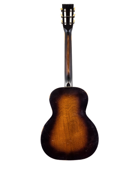 Vintage Regal Dobro Model acoustic guitar from the 1930s, showcasing the beauty of the Gibson J-45 design.