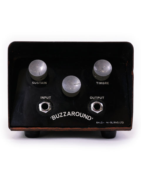 Vintage black and white photo of a Baldwin Burns Buzzaround Fuzz Pedal, UK 1966, highlighting its classic guitar effects design.