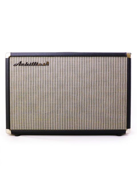 Wooden amp with a black and white checkered pattern, showcasing the Achillies 2x10 Extension Cabinet from Australia, 2022.