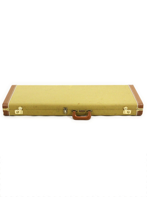 Yellow guitar case with a brown handle on a white background, specifically for the 1992 Fender Telecaster Plus Deluxe model.

