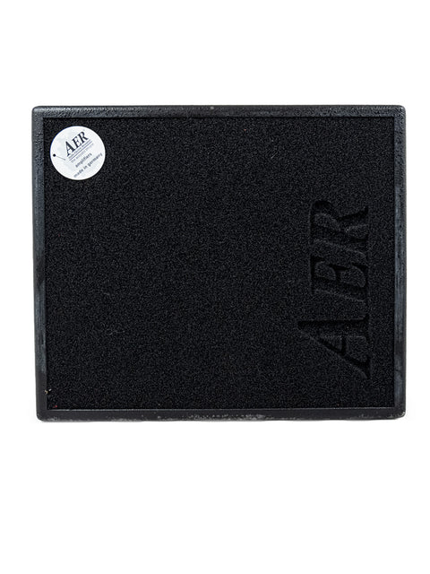 black plastic tray featuring the word "aler," likely associated with the AER Domino 3 Acoustic Guitar Amplifier.